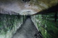 Abandoned bunker tunnel with concrete walls Royalty Free Stock Photo