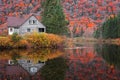Abandoned cabin in Parc de la national Jacques Cartier surrounded with fall foliage