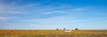 Deserted and abandoned camper in California Golden Orange Poppy field during superbloom spring in southern California high desert Royalty Free Stock Photo