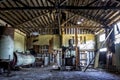 Abandoned Cannery Warehouse Interior with Rusty Machines and Deteriorating Wood