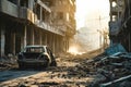 A car lies abandoned and obstructing a street in a city devastated by a rocket attack.