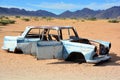 Abandoned car near a service station at Solitaire in the Namib Desert, Royalty Free Stock Photo