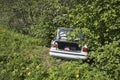 Abandoned car on the roadside forest after accident Royalty Free Stock Photo