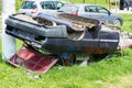 Abandoned car at roadside in a small town Royalty Free Stock Photo