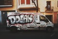Abandoned car slovenly painted with graffiti Royalty Free Stock Photo