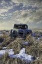 Abandoned car in the tall grass in Neidpath, SK Royalty Free Stock Photo