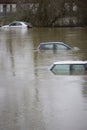 Abandoned Cars Submerged In Flood Water In Parking Lot In Oxfordshire UK January 2024