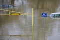 Abandoned Cars Submerged In Flood Water In Parking Lot In Oxfordshire UK January 2024