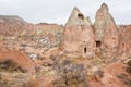 Abandoned carved city in the sandstone rock in the mountains