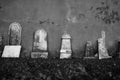 Abandoned cemetery old cement gravestones Royalty Free Stock Photo