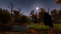 Abandoned cemetery in spooky night forest