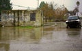 Abandoned center block building in rain