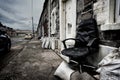 Abandoned chair in a row of houses Royalty Free Stock Photo