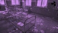 Abandoned children bedroom in kindergarten, details of a ghost city in purple colors, Pripyat, Ukraine. Motion. Scary