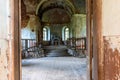 Abandoned church in Latvia, Galgauska, view through the entrance door to the interior Royalty Free Stock Photo