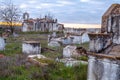 Abandoned church ruin and cemetery overgrown landscape Royalty Free Stock Photo