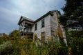 Abandoned Civil War-era House Surrounded by Tall Weeds - Kentucky