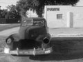 Abandoned classic car and pawn shop