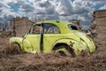 An abandoned classic yellow car in Saskatchewan