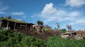 Abandoned and collapsing animal farm building in the field. Deserted places Cyprus