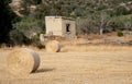 Abandoned collapsing clay house in the fields