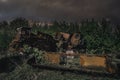 Abandoned combine harvester. Rusty spoiled combine harvester. Post-apocalyptic landscape