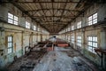 Abandoned concrete factory. Large empty industrial hall Royalty Free Stock Photo