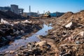 abandoned construction site filled with illegal waste dumping, irresponsible waste disposal.