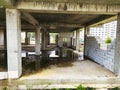 Abandoned construction site of a reinforced concrete monolithic house. Abandoned building materials. Stop financing construction Royalty Free Stock Photo