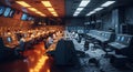 Abandoned control room with multiple rows of computer monitors and desks showing peeling paint and scattered debris on floor Royalty Free Stock Photo