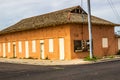 Abandoned Corner Building With Boarded Up Windows