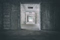 Abandoned corridor of old hotel in Slovakia Urbex. Creepy hallway with vignette. Light at the end of the tunnel. Spooky and dark Royalty Free Stock Photo