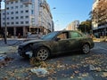Abandoned, damaged car in a street. Insurance concept.