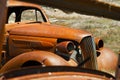 Abandoned decaying vintage car Royalty Free Stock Photo