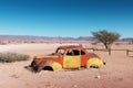 Abandoned derelict old car in the sandy desert Royalty Free Stock Photo