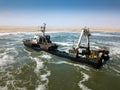 Abandoned and derelict old shipwreck Zeila at the Atlantic Coast near Swakopmund and famous Skeleton Coast in Namibia