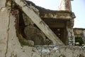 Abandoned destroyed by the explosion, bombing and shelling the destroyed building. Holes from shells, traces of bullets and splint