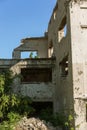 Abandoned destroyed by the explosion, bombing and shelling the destroyed building. Holes from shells, traces of bullets and splint