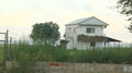 Abandoned detached house by the sea. abandoned house surrounded by wire fences