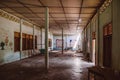 Abandoned devastated school class room with natural light through window