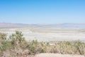 Abandoned dirty shoreline of the Salton Sea in Bombay Beach California on a sunny day Royalty Free Stock Photo