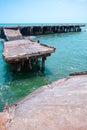 Abandoned dock in Masachapa, Nicaragua. An old pier in a beach.