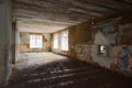 Abandoned empty shabby room with big windows Royalty Free Stock Photo