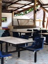 Abandoned empty tables chairs seats set in school canteen lunch room during COVID pandemic Royalty Free Stock Photo