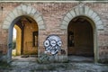 Abandoned factory arches with murals