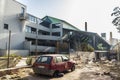 Abandoned factory and car smashed in Palermo, Sicily, Italy