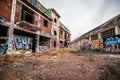 Abandoned factory, destroyed with graffiti on the walls