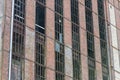 Abandoned factory facade. Rusted windows without glass Royalty Free Stock Photo