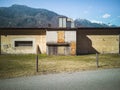 Abandoned factory front view in the valley. Glimpse of Biasca in Switzerland Royalty Free Stock Photo