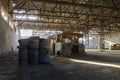 Abandoned factory hangar, where games are held in paintball Royalty Free Stock Photo
